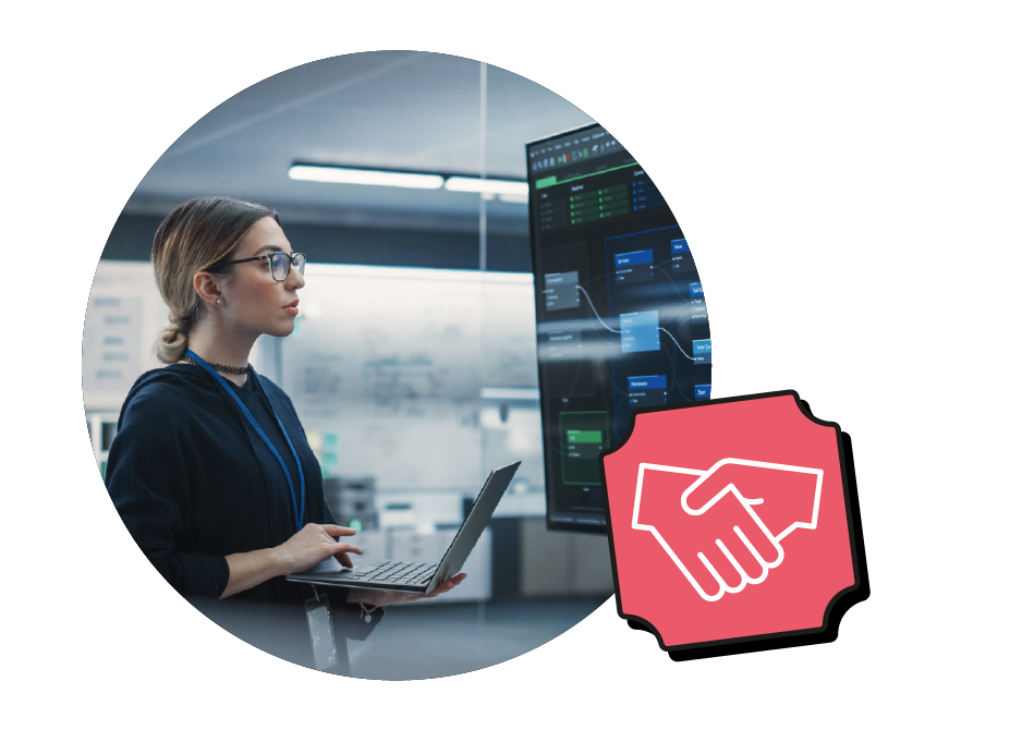 Woman using laptop with big screen in front of her using and programming an AI software
