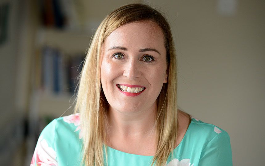 Social Change UK chief executive, Kelly Hunstone, smiles at the camera.
