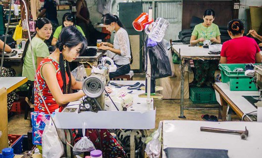 Women working in a sweat shop.