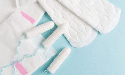 A collection of period products, including tampons, sanitary towels and period underwear.