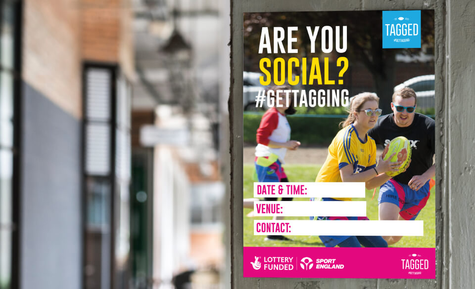 Poster of Tagged campaign, displayed with a street backdrop.