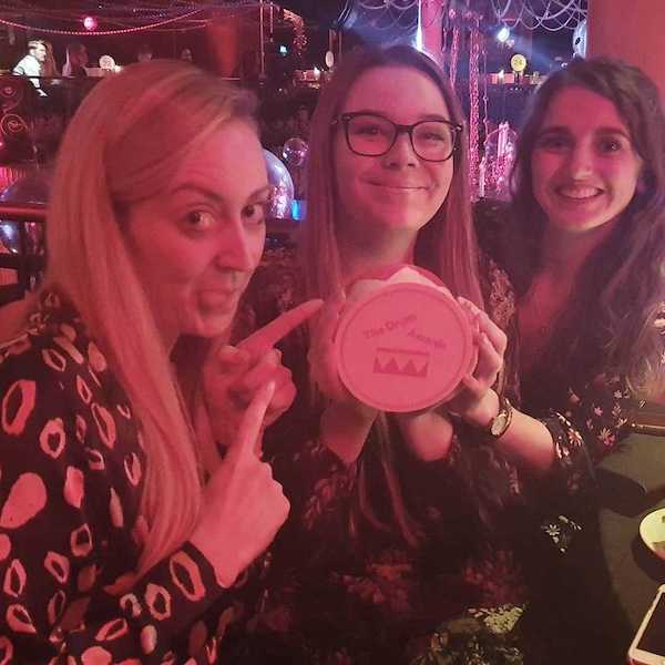 Jo, Savannah and Daisy pose with Social Change UK's Social Purpose award at the Drum awards.